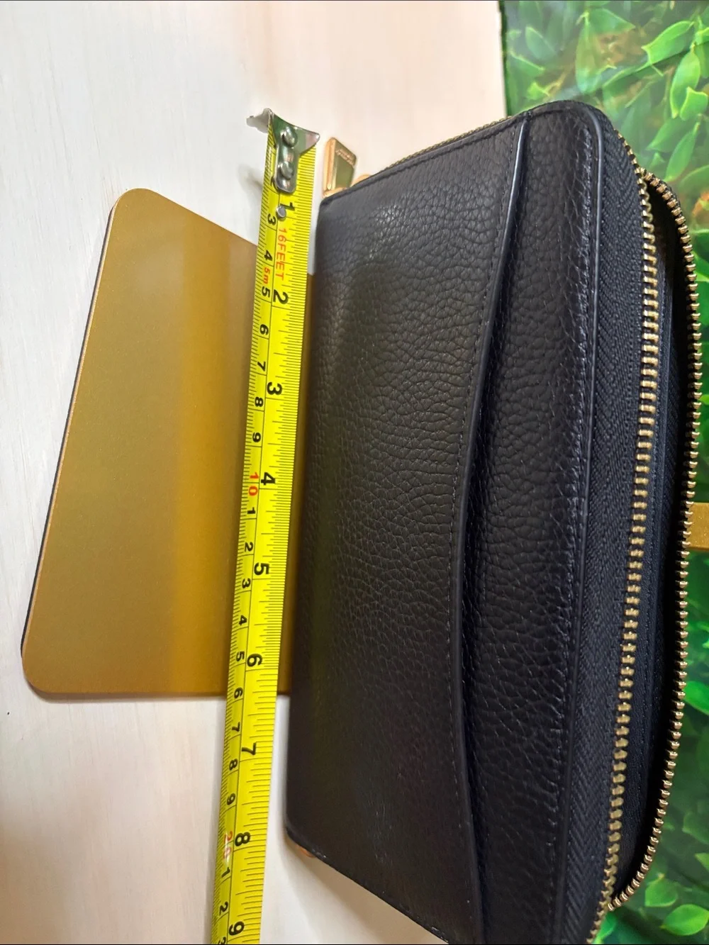 kate spade black pebbled leather zip-around wallet with gold logo